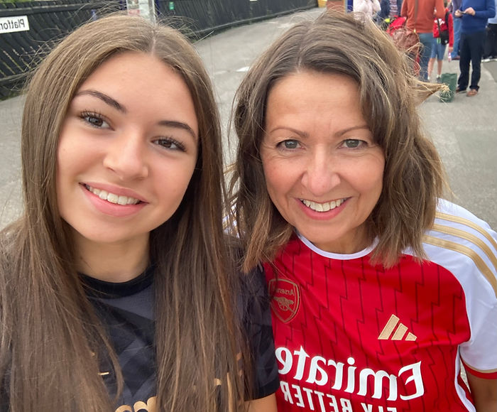 Eliza and Angela Newton outside the Emirates Stadium in Arsenal shirts