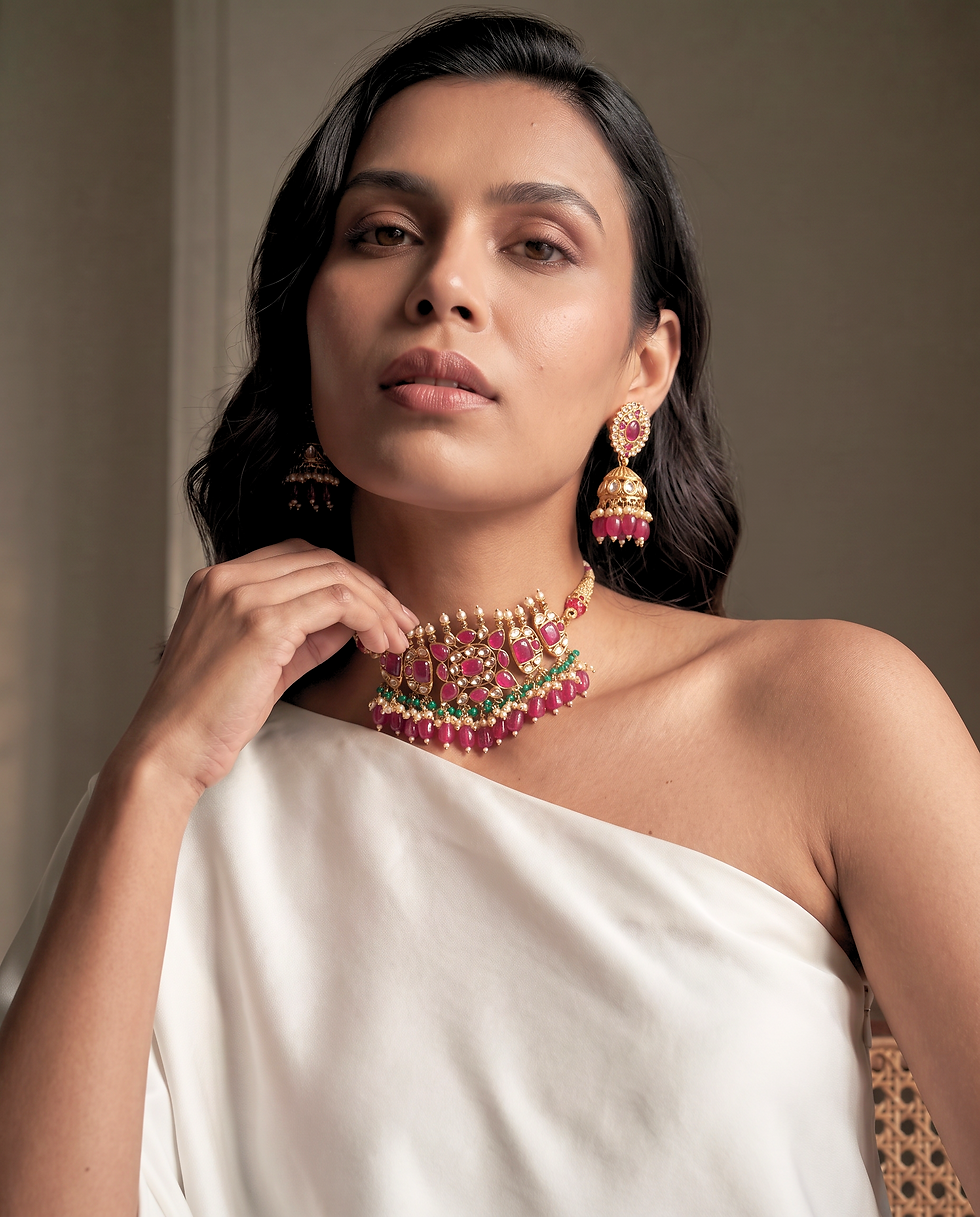 Thumbnail: Model wearing Vera Choker Gold-Plated Kundan Necklace & Earring Set by Nury Nury.