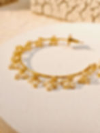 Celestial Hoops from SONM — elegant gold-plated hoops adorned with pearls and celestial motifs. Buy luxury fashion jewellery today at SONM