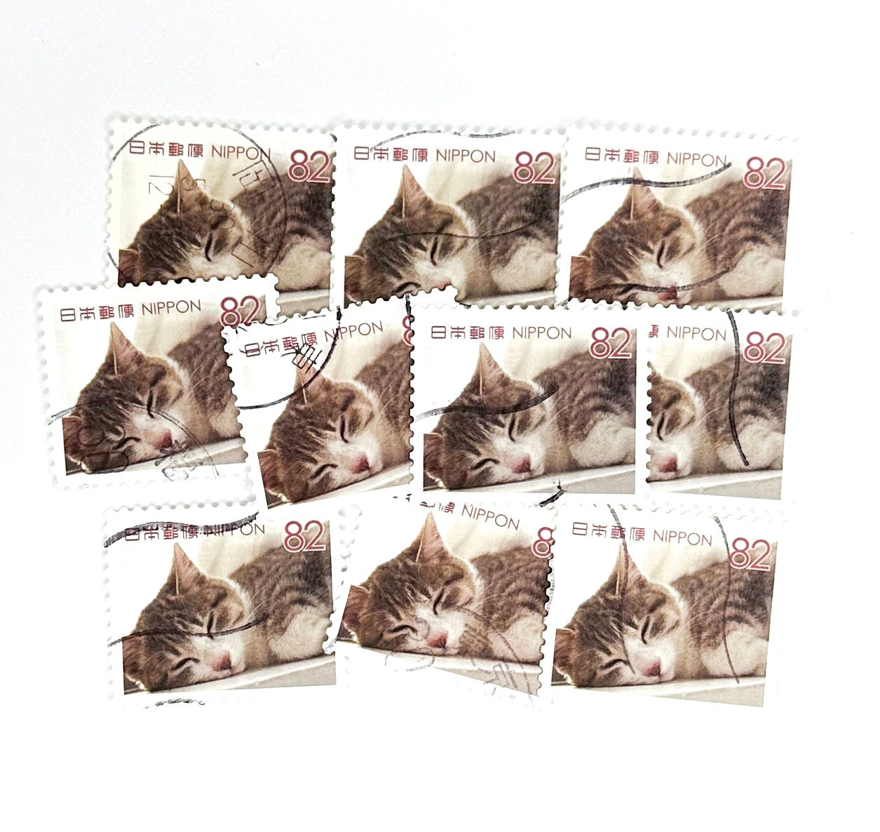 10 x Kitten Sleeping Japanese postage stamps off paper - Cat Kitty