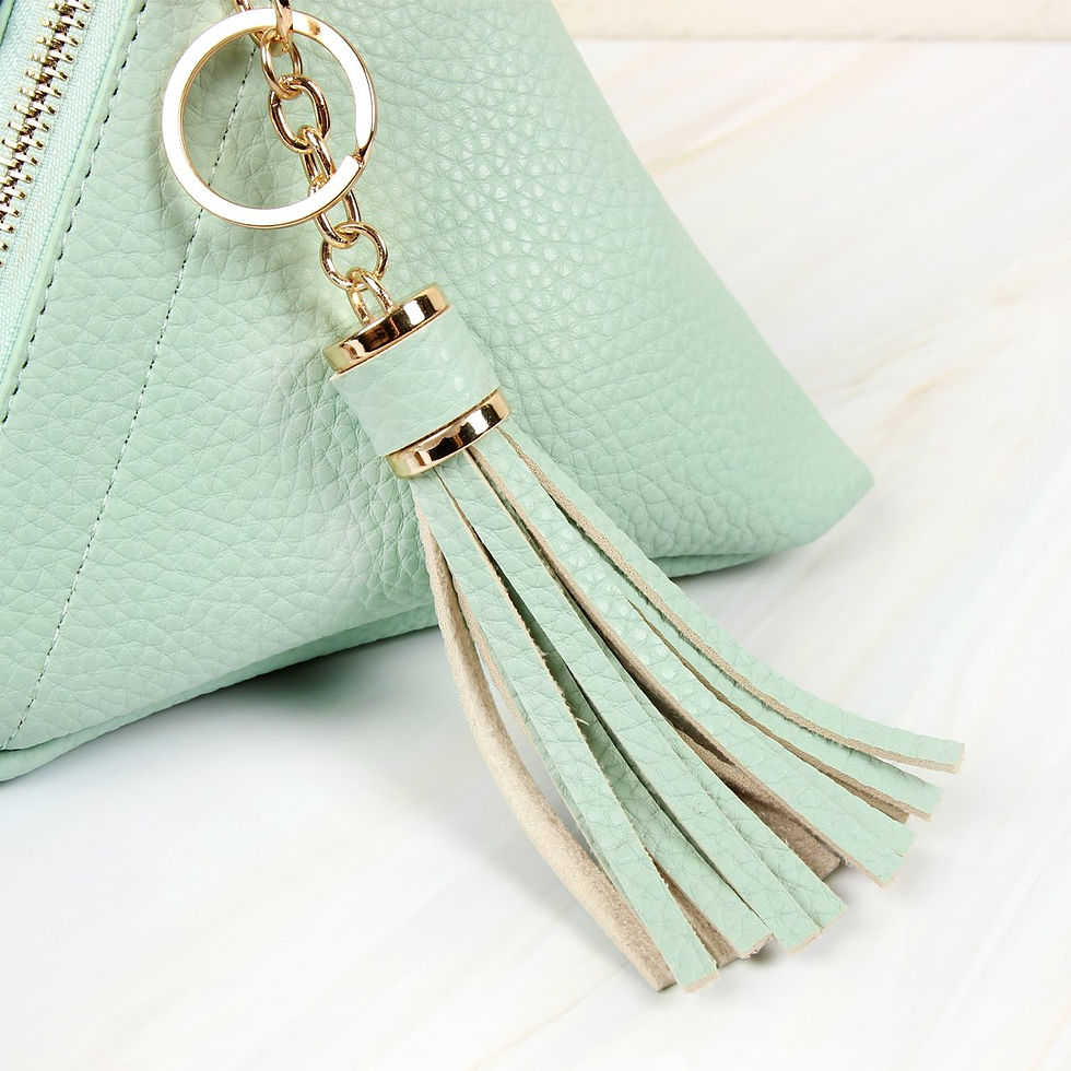Thumbnail: 7092 - Pyramid Shape Tassel Wristlet Leather Bag