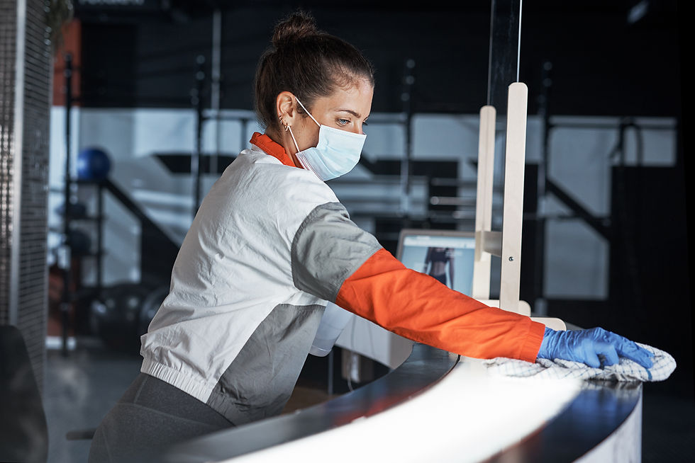 shot-of-a-young-woman-cleaning-the-reception-desk-2026-03-25-07-02-02-utc.jpg
