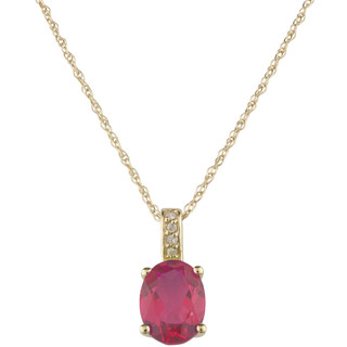 July: Yellow Gold Oval Ruby and Diamond Pendant