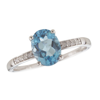 December: White Gold Oval Blue Topaz and Diamond Ring