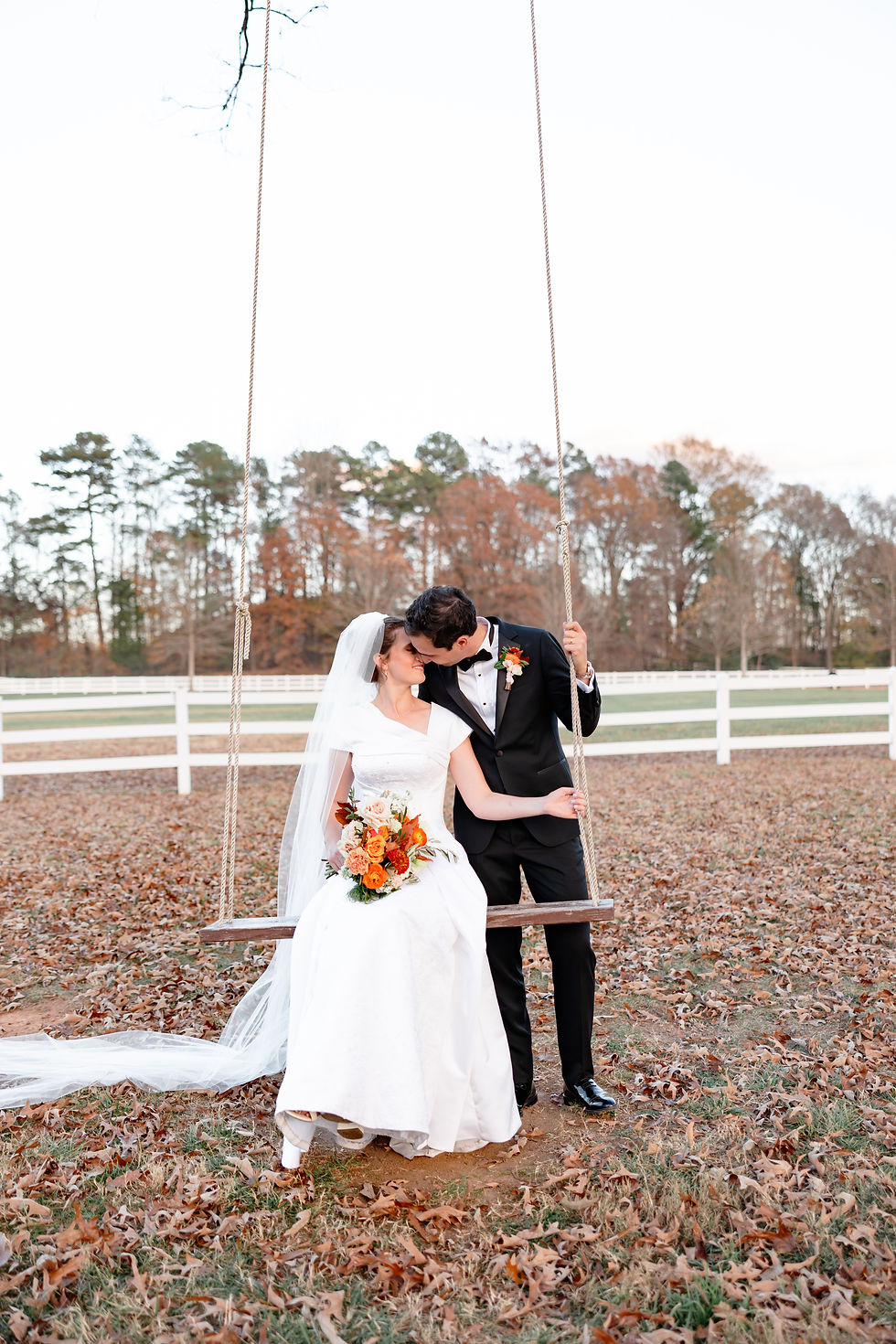 Wedding portraits in the fields at Pleasant Grove Farm near Charlotte, North Carolina