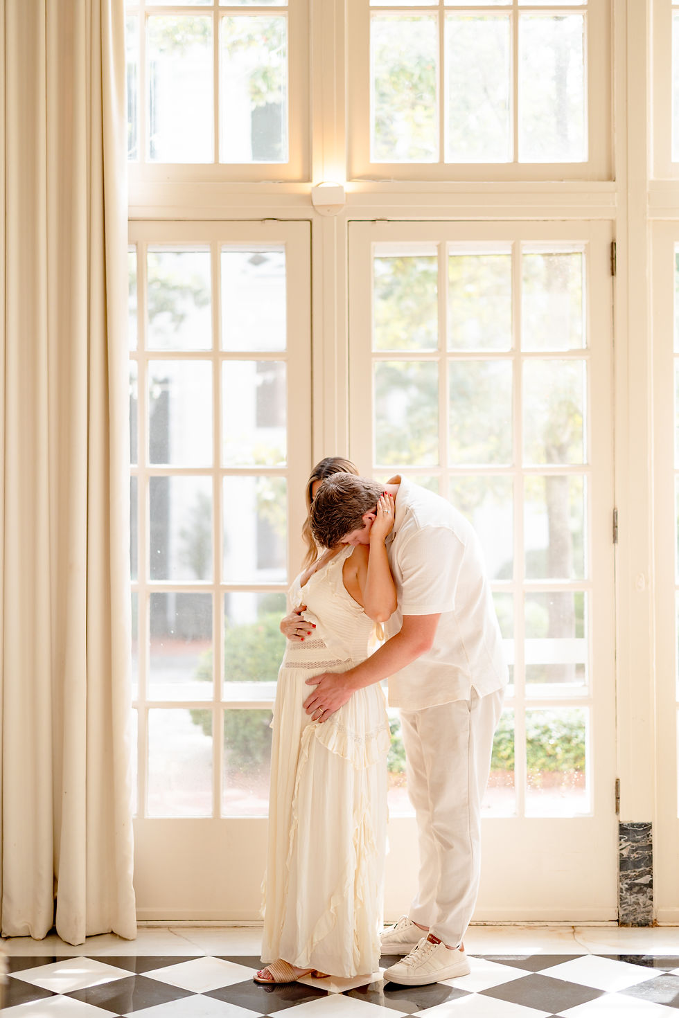 Natural light maternity session in the solarium at The Duke Mansion, Charlotte North Carolina
