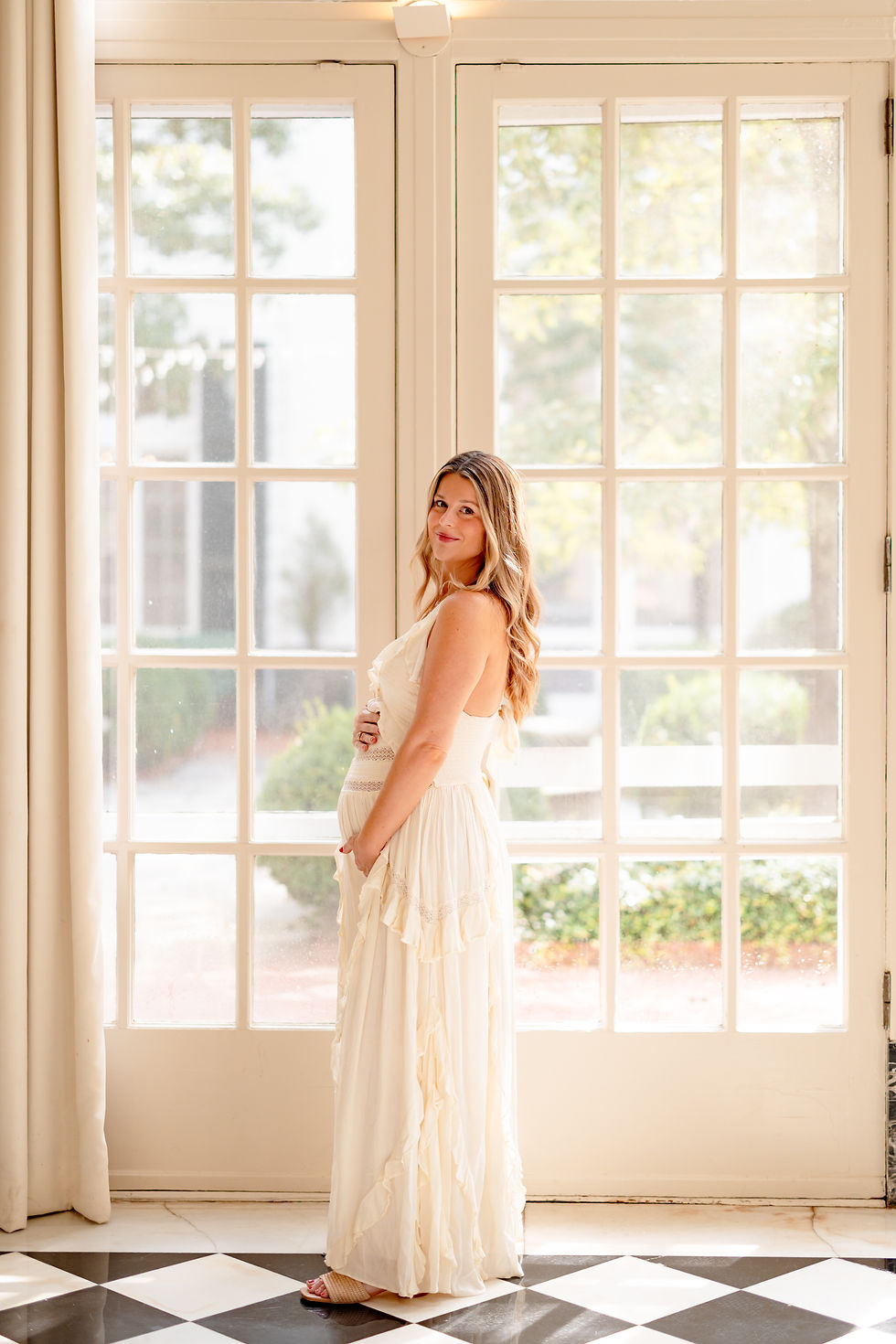 Natural light maternity portrait in the Duke Endowment Solarium at The Duke Mansion Charlotte