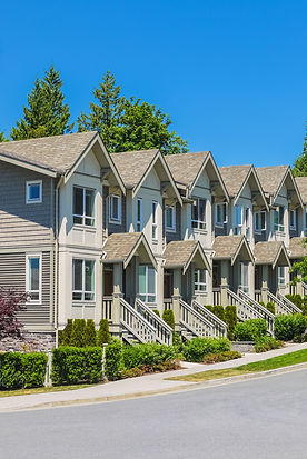 brand-new-townhouses-row-bright-sunny-day.jpg