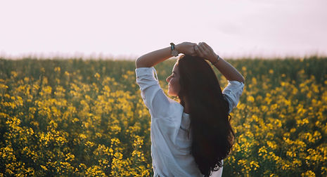 woman in a field of flowers