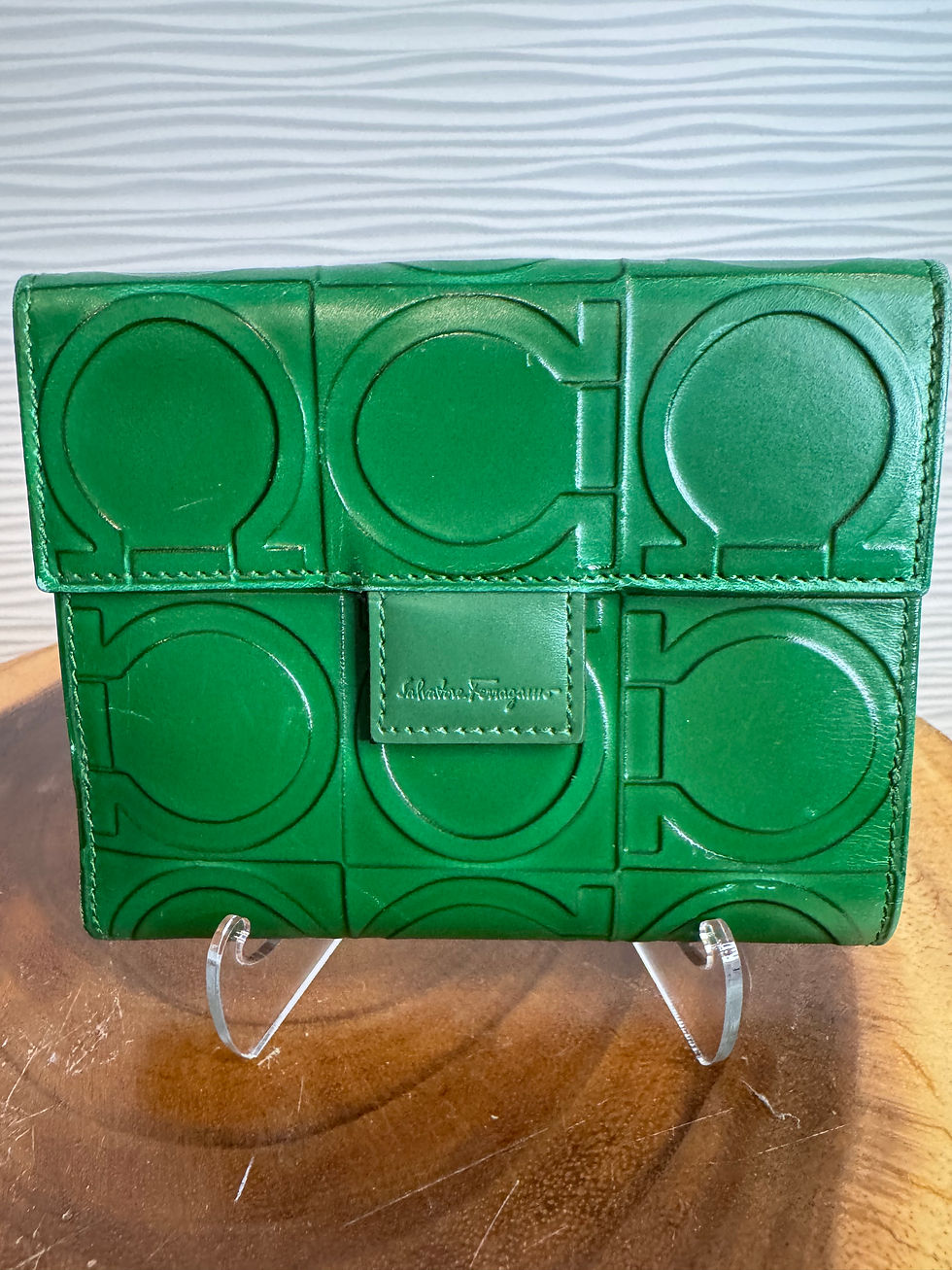Thumbnail: Green Salvatore Ferragamo Gancini wallet featuring an embossed logo pattern.
