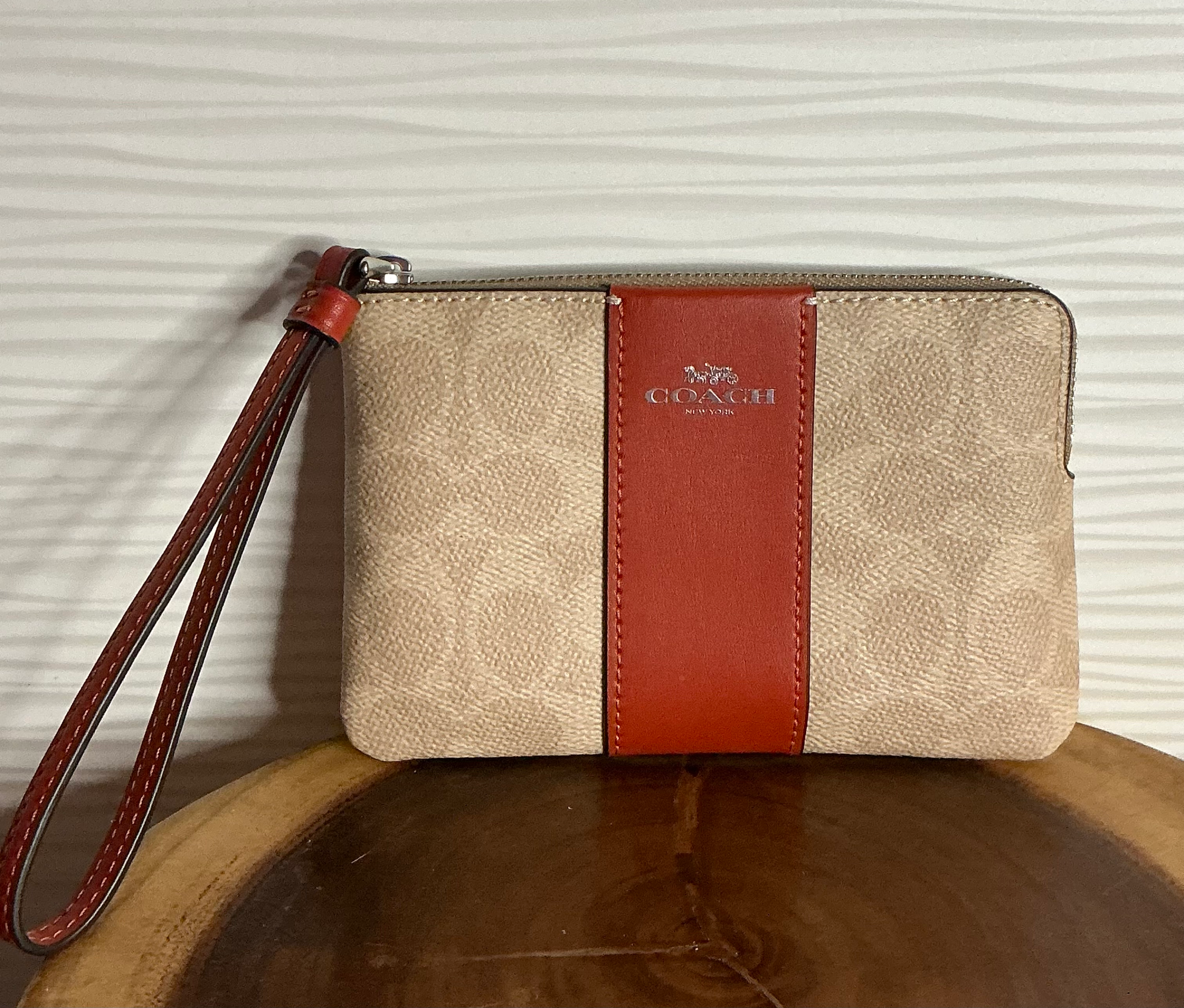 Coach Tan and Burnt Orange Strip wristlet