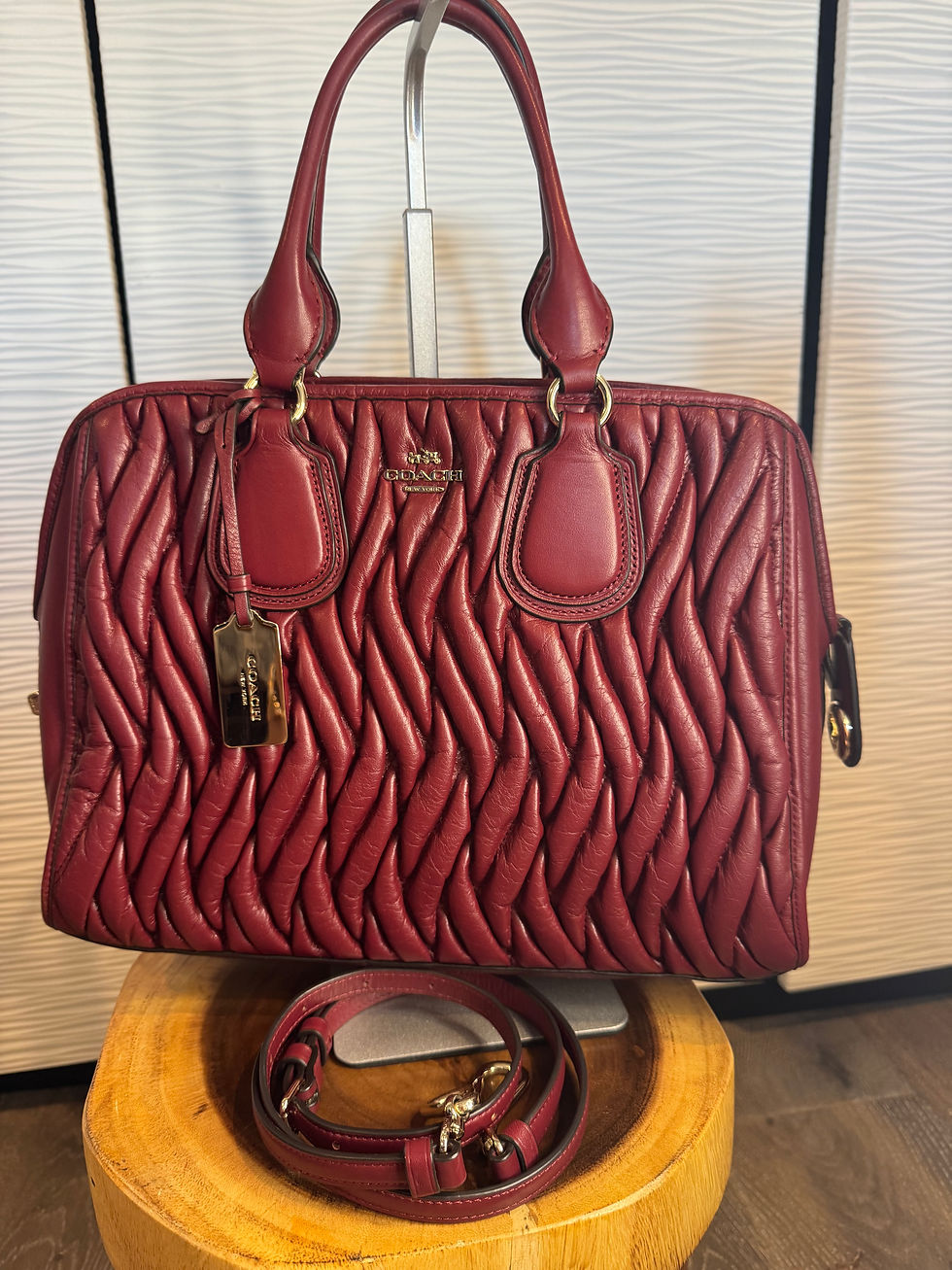 Thumbnail: Coach Nolita Matelasse bag in a rich dark red, quilted gathered leather.