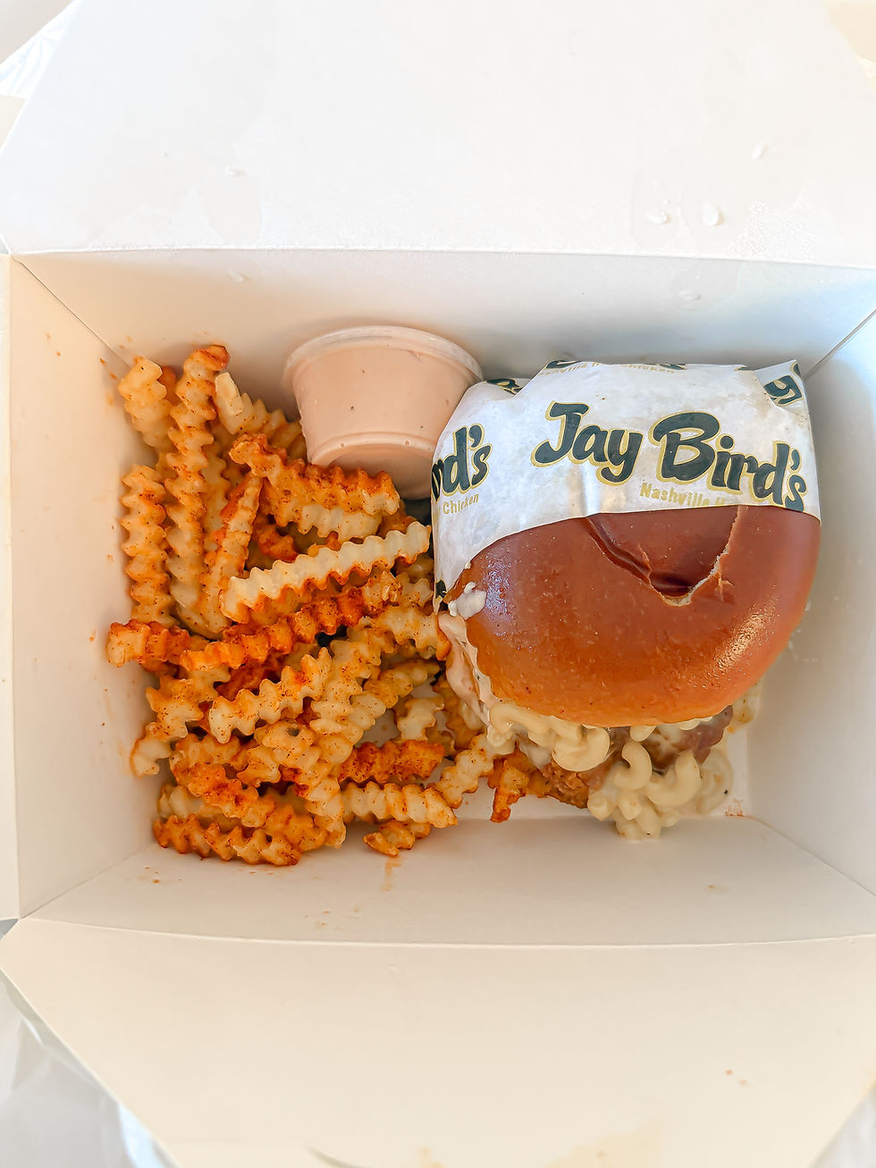 Jay Bird’s Mac Daddy hot chicken sandwich with fries in Arizona.