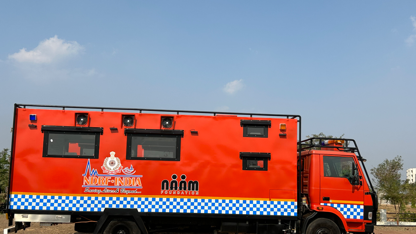 Mobile kitchen truck designed for NDRF with efficient cooking and storage layout.