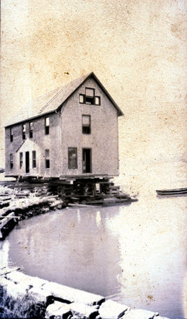 DWF-5 Eugene Fisks house jacked on cribbing after move, 29 Chim Cor C, July 31, 1920      