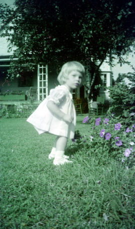 DWF-45 Girl in garden (color photo) at #21 Chimney Corner Circle .jpg