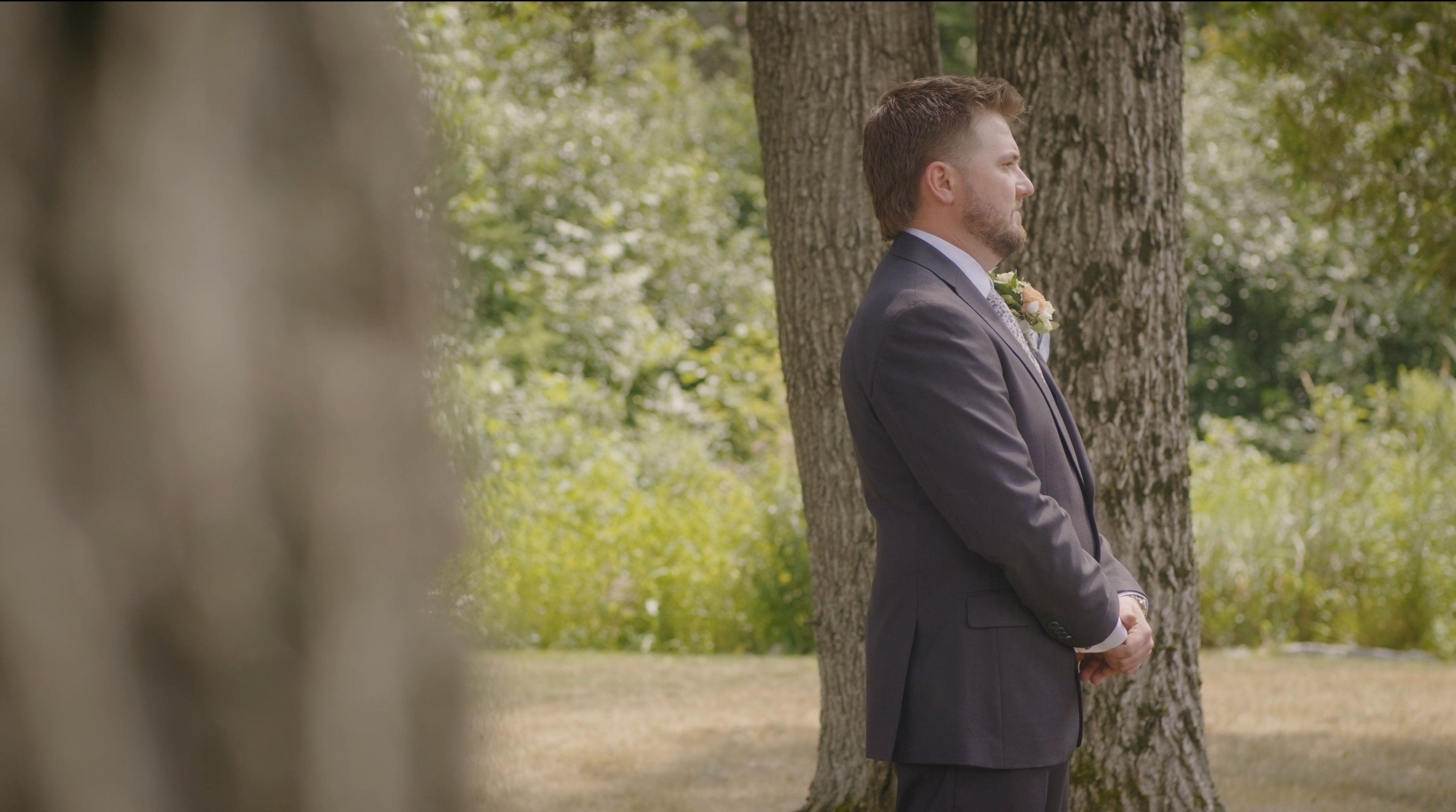 Wedding videography capturing the moments before a couple’s first look