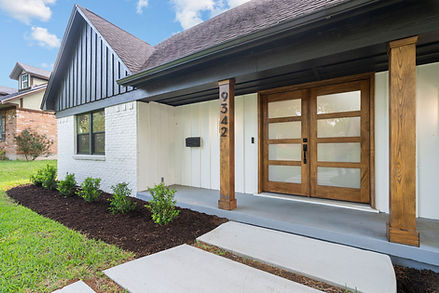 Reimagined open-concept living area at 9342 Springwater Dr, showing a seamless, bright layout from the front entry to the back