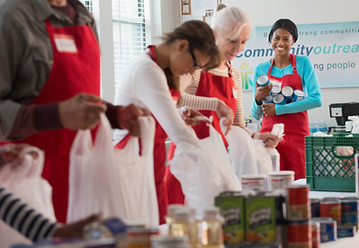Volunteers Packing Food