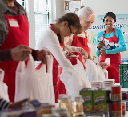 Volunteers Packing Food 