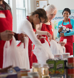 Volunteers Packing Food