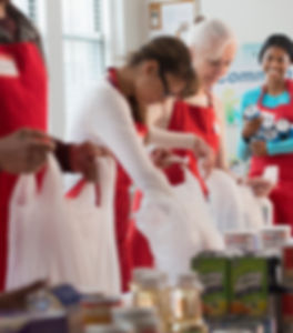 Volunteers Packing Food