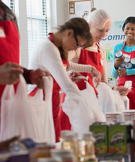 Volunteers Packing Food 