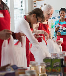 Volunteers Packing Food