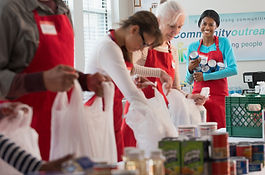 Volunteers Packing Food