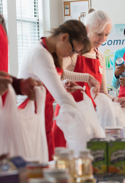Volunteers Packing Food