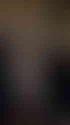 Massive paper-mâché Rangda statue carried during the Ogoh-Ogoh parade, created to ward off malevolent forces