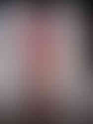 Vivid and elaborate Rangda mask used in Barong performances, symbolizing chaos and dark magic in Balinese culture