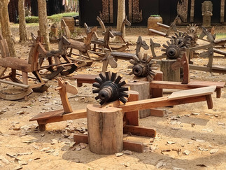 Exquisite ornamental sculptures at Baan Dam Museum, each meticulously crafted to represent spiritual and natural elements