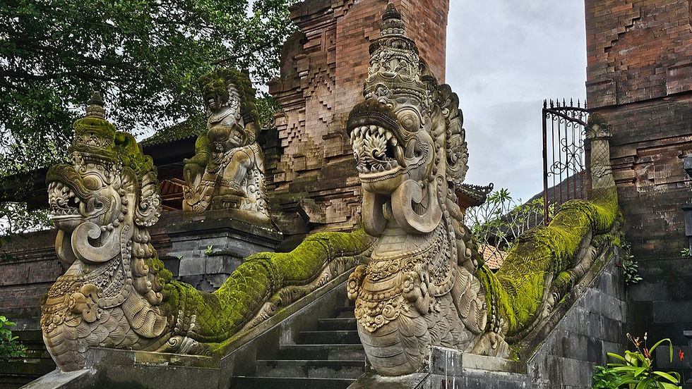 Ornate stone dragon sculptures with green moss on temple steps, surrounded by greenery and brick structure, evoke a mystical ambiance.