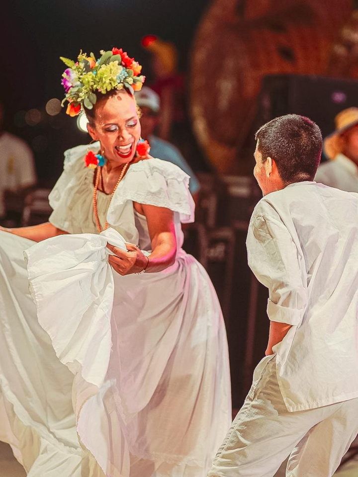 Couple dancing Bullerengue at a festival in Colombia
