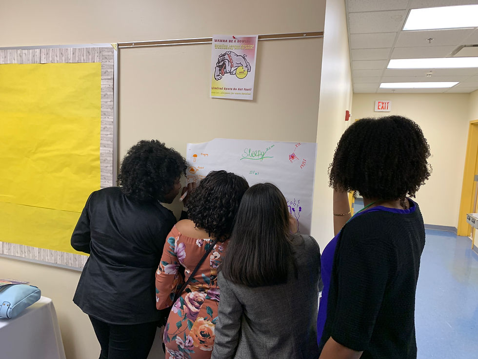 Students work at a conference as part of the Overcomer Leadership Institute