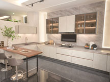 Aura Series stainless steel kitchen cabinet with elegant luminous finish, fabricated and installed by Radiant Edge Design Singapore