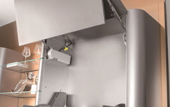 Soft-close lift-up upper cabinet door mechanism, stainless steel kitchen cabinet by Radiant Edge Design Singapore