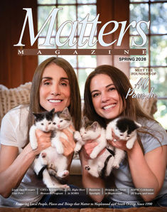 Two women with kittens