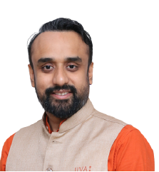 Smiling man in beige vest and orange shirt, posed against a white background.