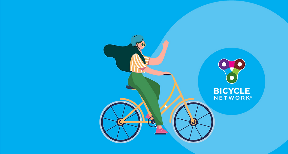 Bicycle Network illustration of woman riding a bike