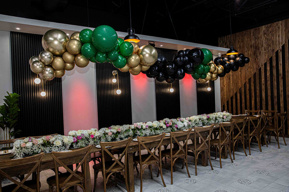 Balloons floating over table