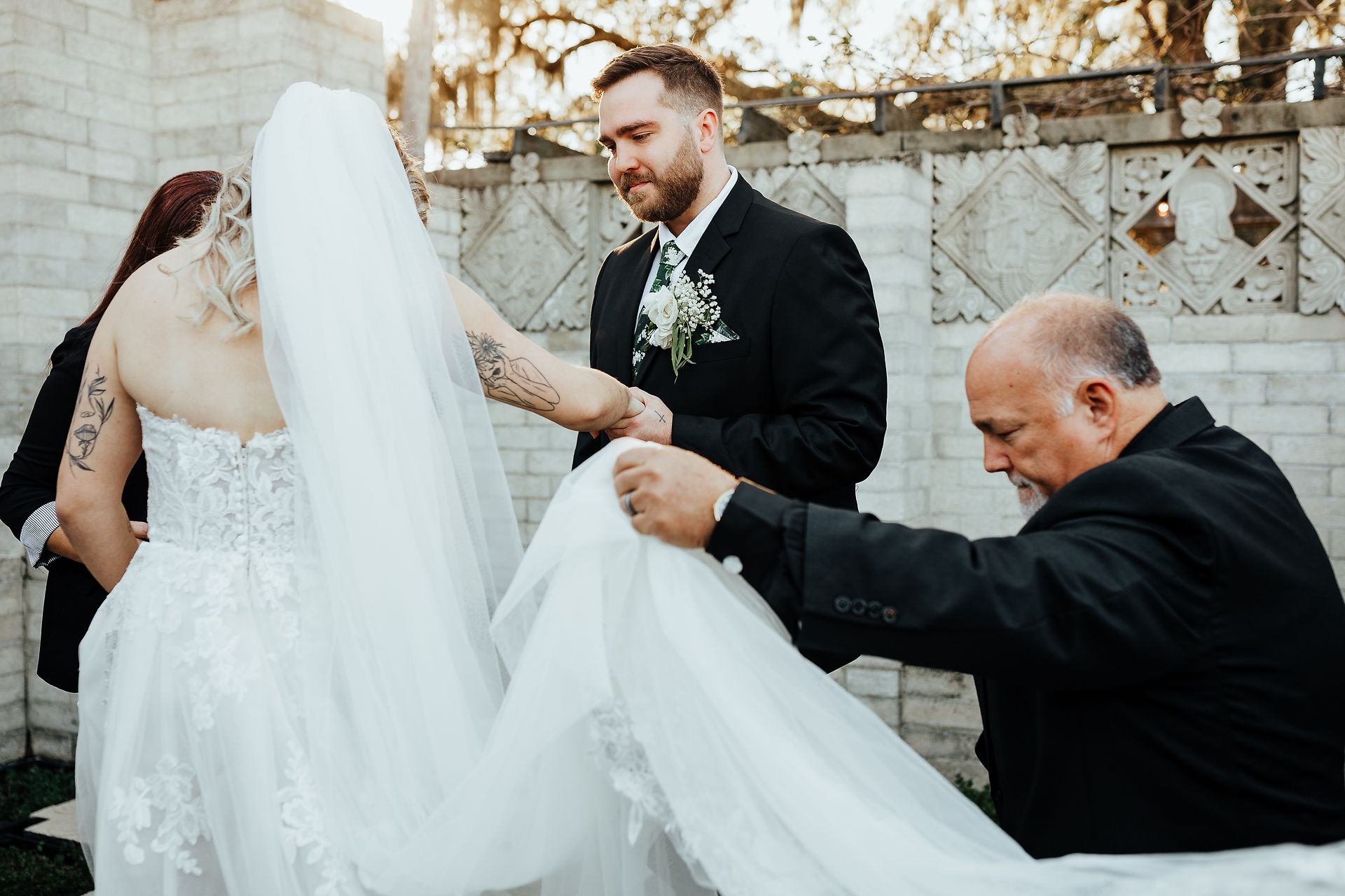 Dad helps the bride with her veil at wedding ceremony at Maitland wedding venue 
