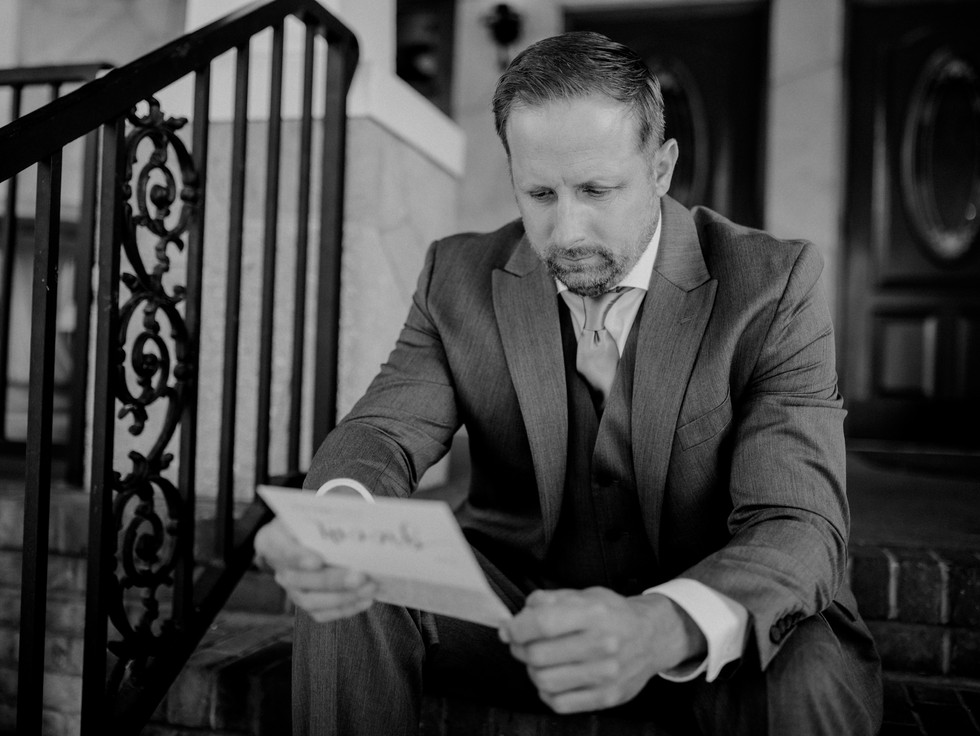 groom reading letter