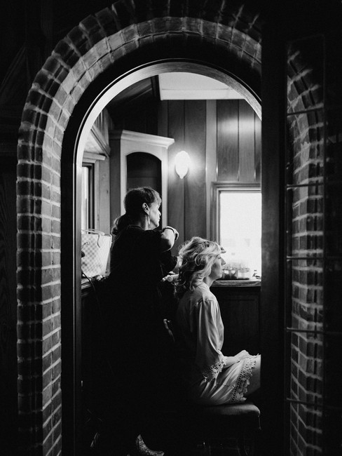 woman has her hair styled