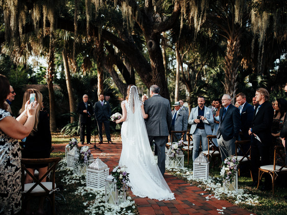 Father walking bride down the aisle