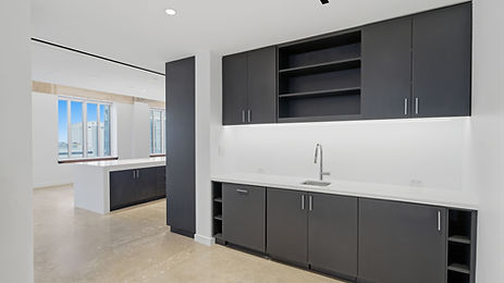 A Coffee Bar/Collaboration Area is centrally located with downtown views.