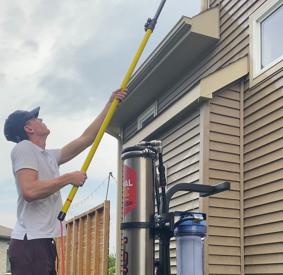 Clearviews Owner Cleaning Window_edited