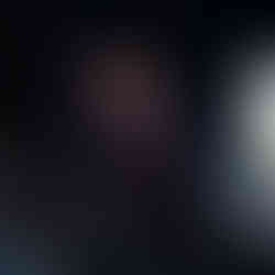 man with photographer behind him