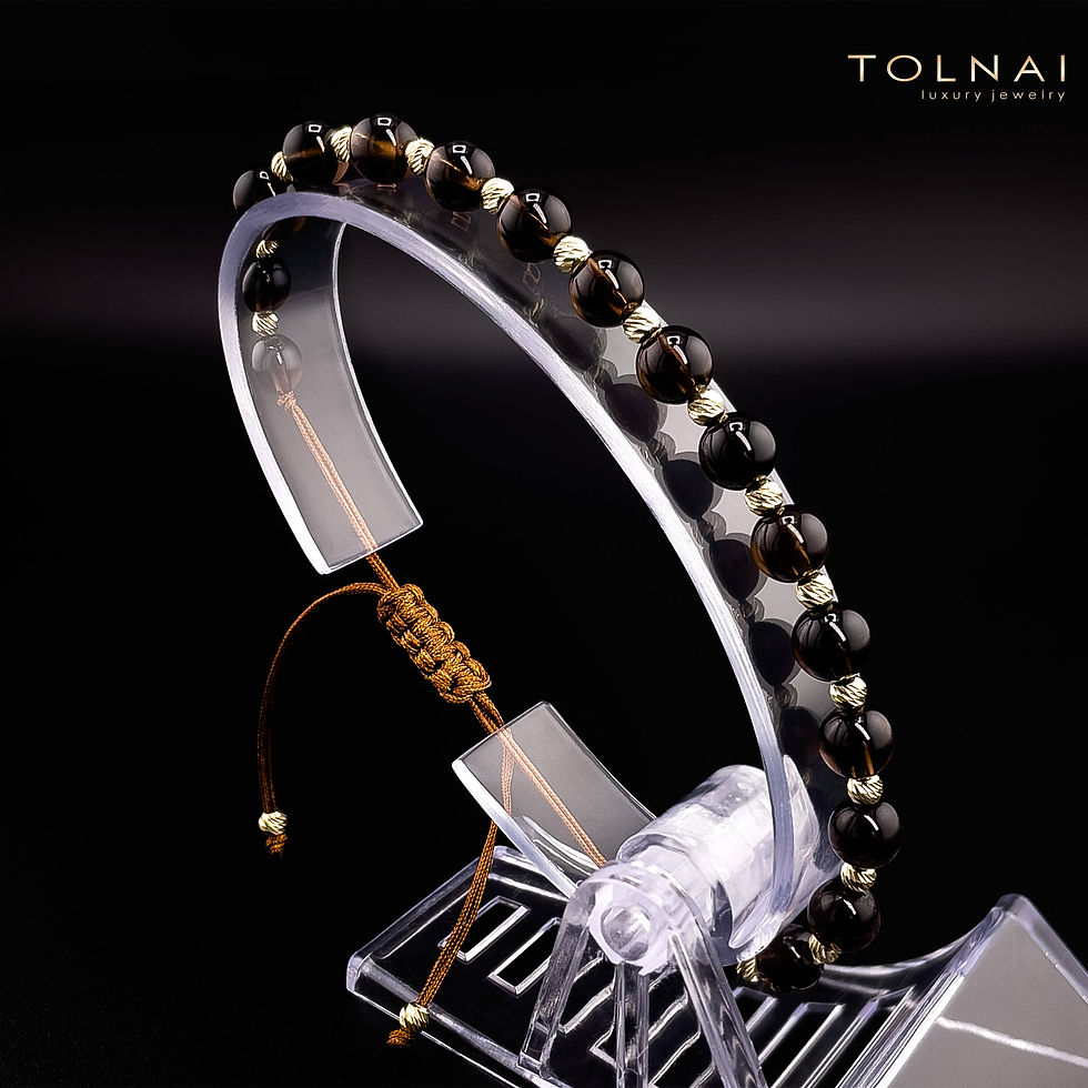 Indexkép: Elegáns női ékszer, órakísérő 14 karátos arany gyöngyökkel.